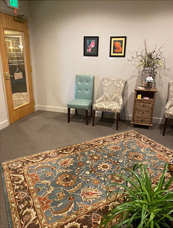 Hall entry leads to a comfortable waiting room.